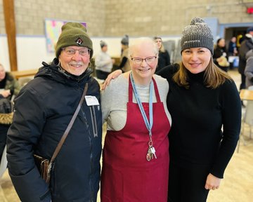 Grant Birks, a longtime SHOW supporter poses with Cathie Stewart-Savage (our chef for the night) and MPP Catherine Fife
