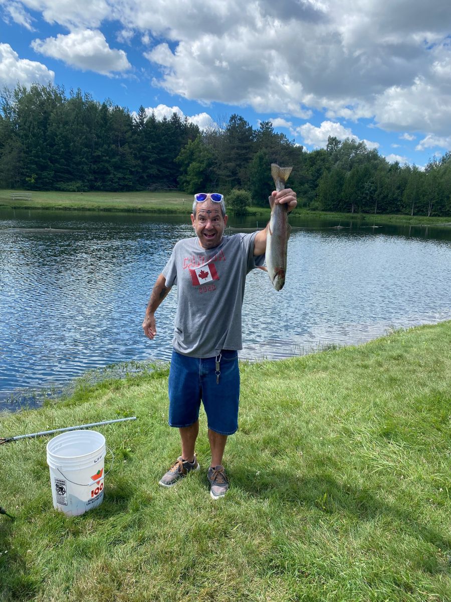 Mike is pretty impressed with his catch!!